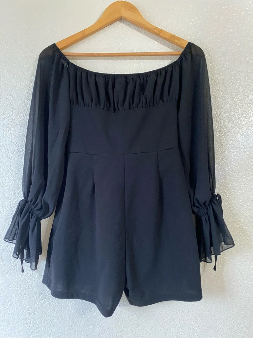 PrettyLittleThing Black offf the shoulder romper